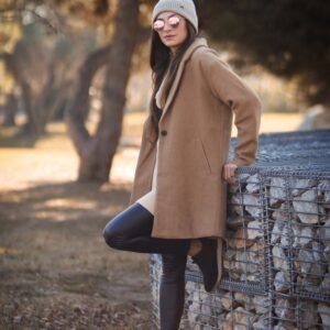 Female camel colored over coat